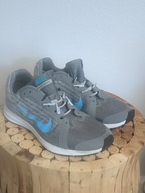 Nike Grey Shoe with Blue Swoosh and Lime Green Insole